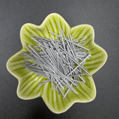 Fibra de polipropileno de macrofibras sintéticas para el refuerzo de hormigón y su uso en materiales de relleno